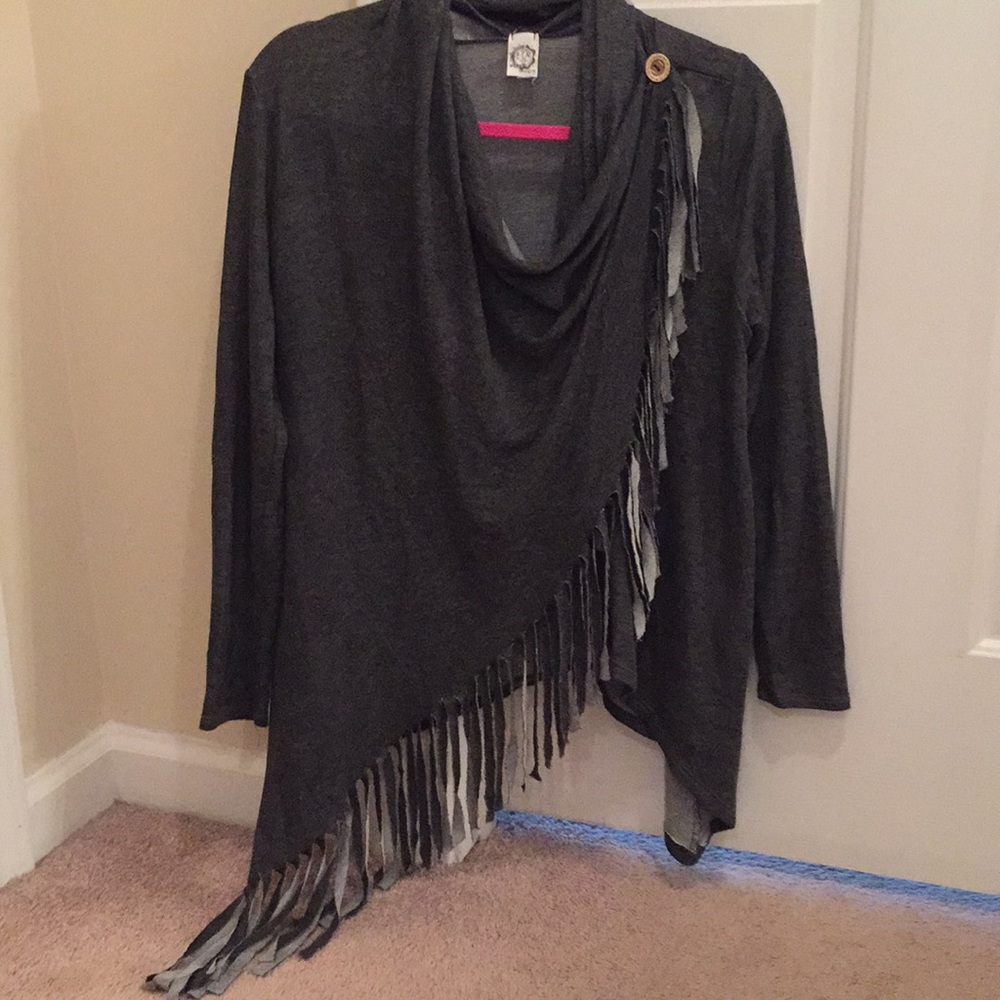 Long sleeve wrap fringe top with button!